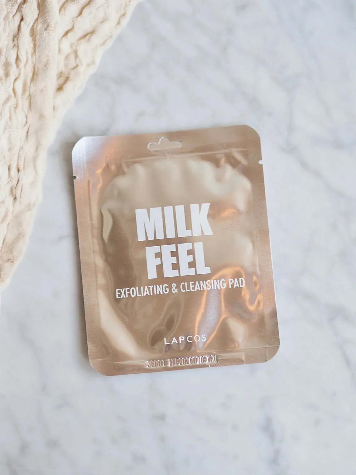 Milk Feel Exfoliating & Cleansing Pad